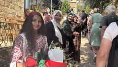 Women employed by Beit Khayrat Souf in Souf, Jordan, greet G Adventures travelers at the restaurant. It was founded in 2016 with the goal of employing women who live in the region.