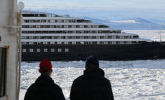 The Scenic Eclipse II receiving Coast Guard assistance in Antarctica.