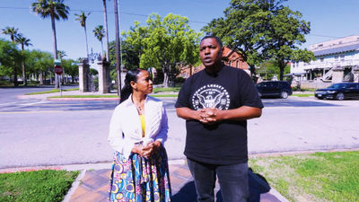 Denella Ri'chard and historian Sam Collins discuss the Juneteenth legacy on a walk through Galveston.